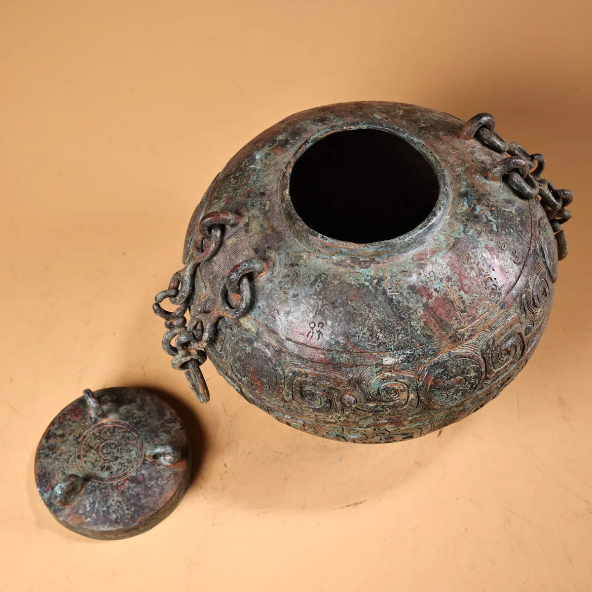 Tibetan Temple Bronze Beam-Handled Jar – Verdigris & Cinnabar Beast-Head Pot (7")
