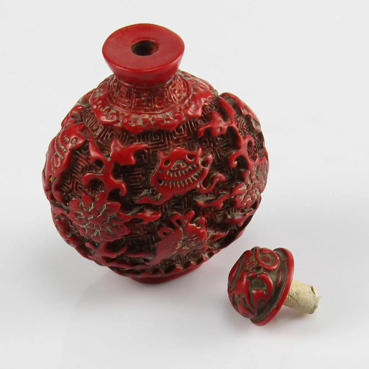 Coral‑Carved Flower & Fish Lucky Snuff Bottle – Chinese Collectible