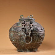 Tibetan Temple Bronze Beam-Handled Jar – Verdigris & Cinnabar Beast-Head Pot (7")