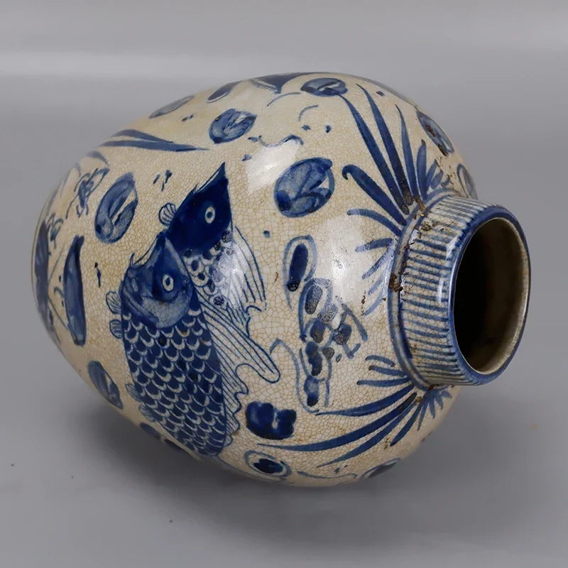 Yuan-Style Blue and White Lotus Seed Jar – Hand-Painted Fish Bath Pattern