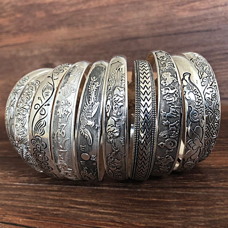 Handcrafted Tibetan Miao Silver Artisan Bracelet for Boho Fashion