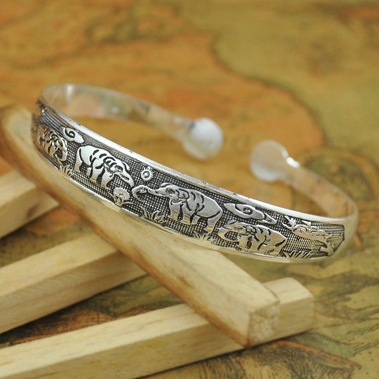 Handcrafted Tibetan Miao Silver Artisan Bracelet for Boho Fashion