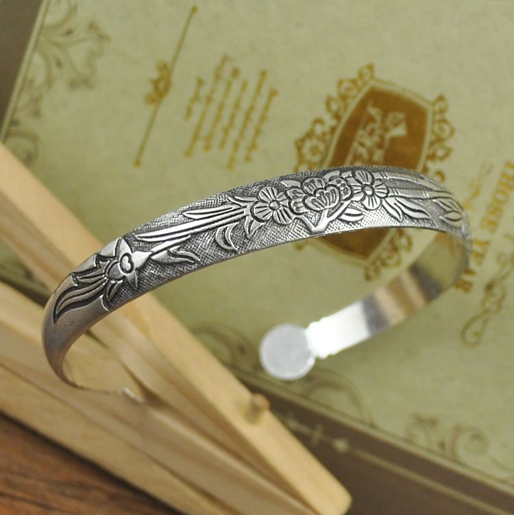 Handcrafted Tibetan Miao Silver Artisan Bracelet for Boho Fashion