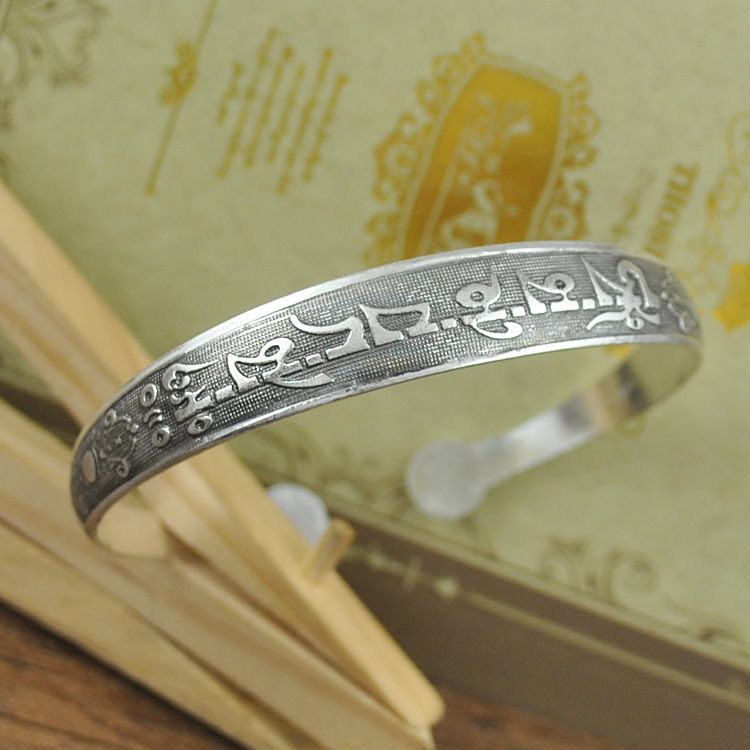 Handcrafted Tibetan Miao Silver Artisan Bracelet for Boho Fashion